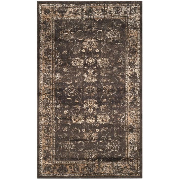 a rug with an ornate design on the top and bottom, in dark brown tones