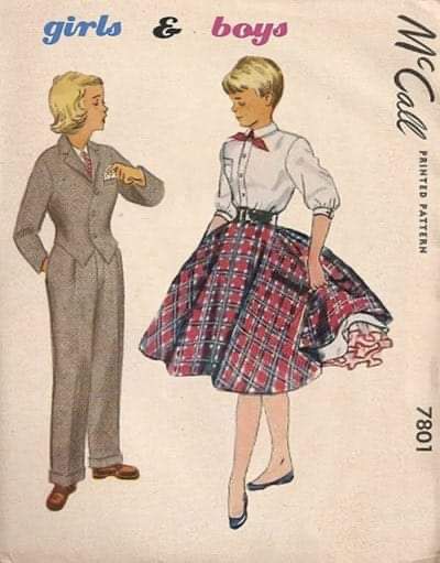 a woman in a skirt and shirt is standing next to a man wearing a suit