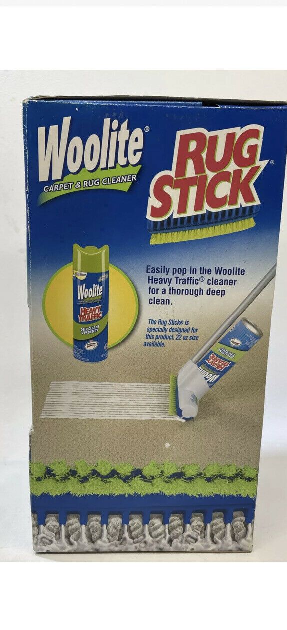 a package of woolite rug stick with the box open and cleaning mop inside