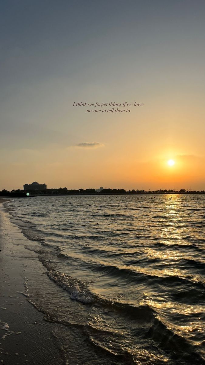 the sun is setting over the ocean with waves coming in from the shore and an inspirational quote written on it