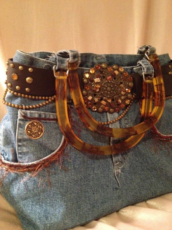 a pair of jeans with studded accents on them