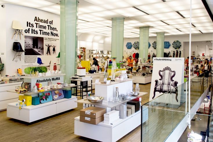 the inside of a store filled with lots of furniture and decor on display in glass cases