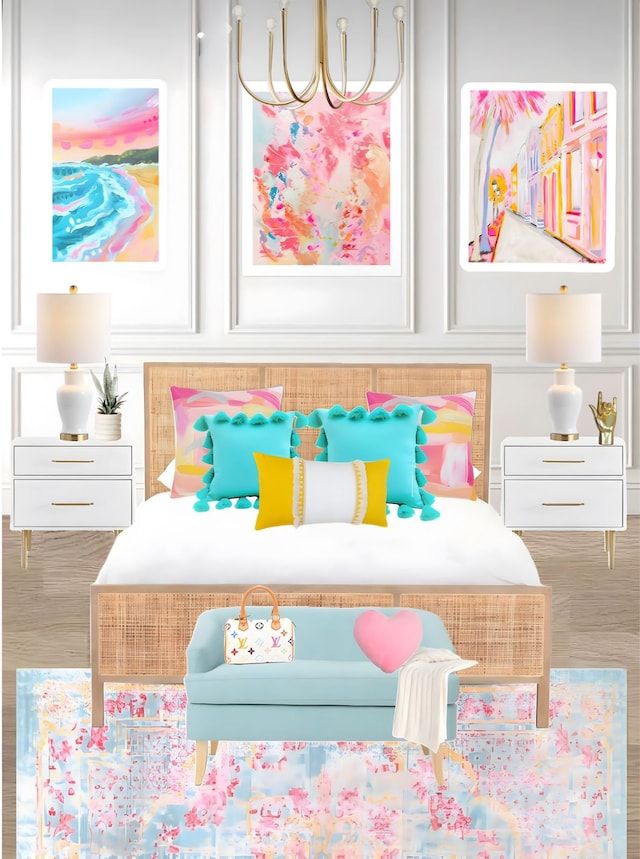 a bedroom with pink, blue and yellow decor on the wall next to a bed