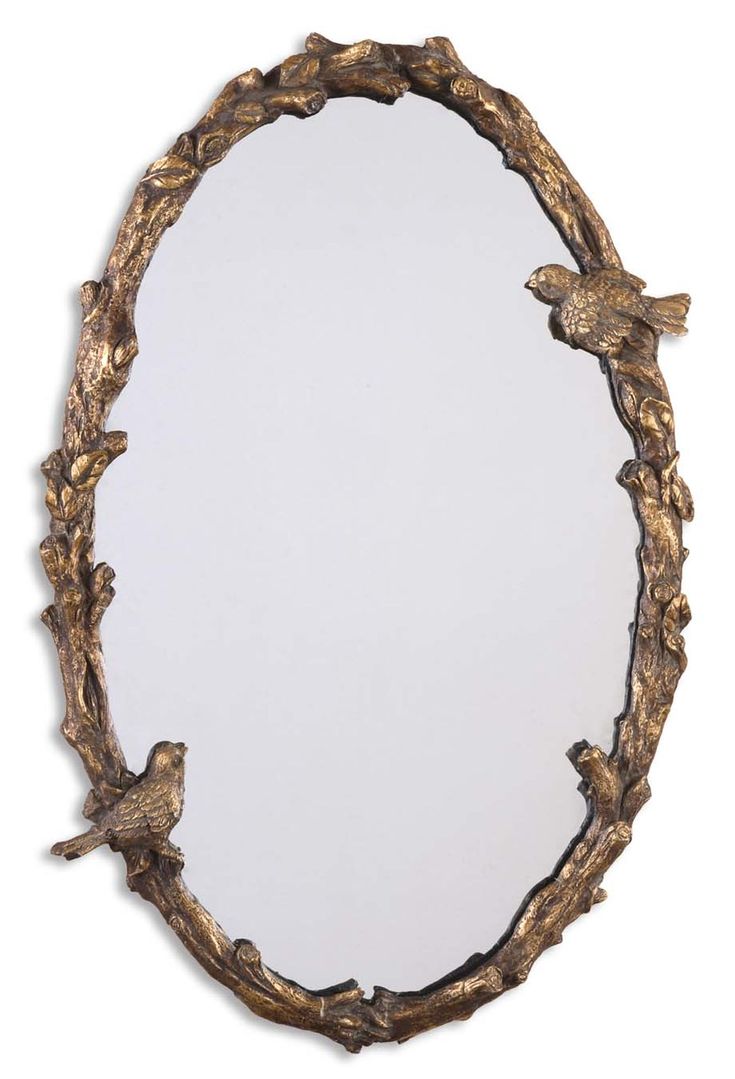 a mirror that has birds on it