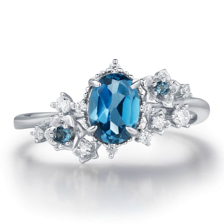 Wrap your love in the mystique of the night with our Midnight Veil London Blue Topaz Ring. This captivating piece features a deep, dazzling oval London blue topaz right at the center, surrounded by a sparkle of white gems and extra pops of London blue topaz accents within the gorgeous floral patterns that resemble a moonlit garden in full bloom—so romantic and whimsical! Celebrate your unique love with a ring that’s as extraordinary as you are. ✦ Available in both 14K white gold vermeil (14K whi Moonlit Garden, Gold Vermeil Jewelry, London Blue Topaz Ring, Ring White Gold, Forever Jewelry, Vermeil Jewelry, Agate Ring, Agate Necklace, Jewelry Ring Box