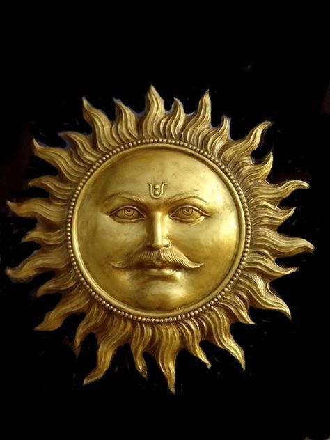 a golden sun with a face on it