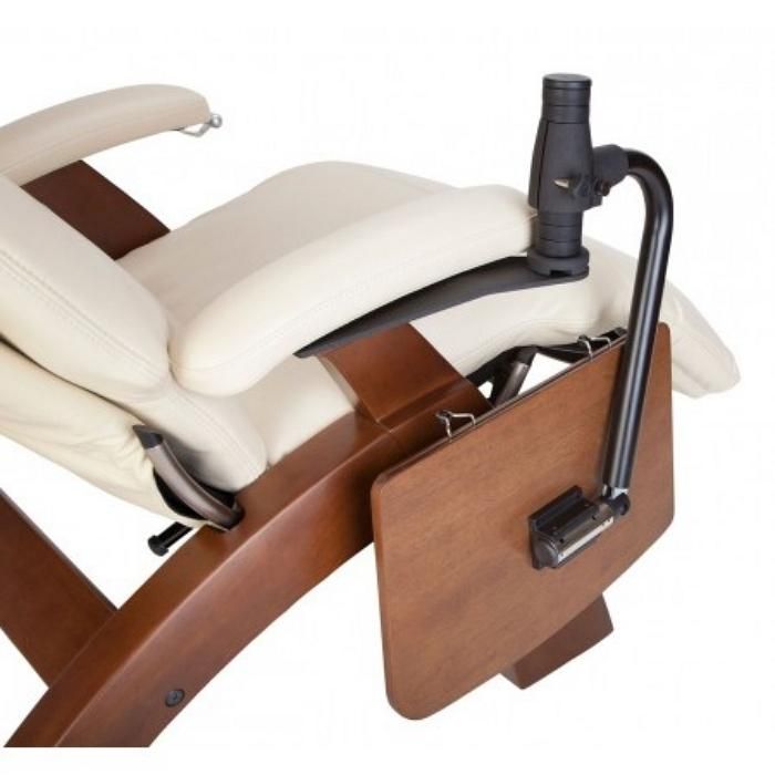 a white leather reclining chair with wooden frame and foot rest in front of it