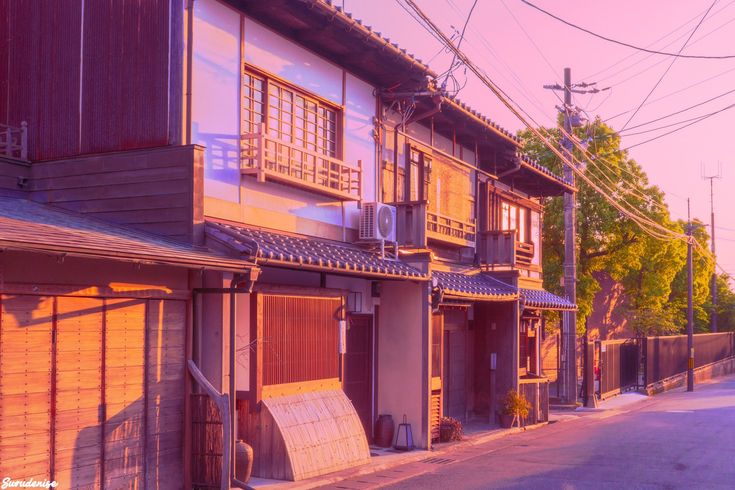 a row of houses on the side of a street