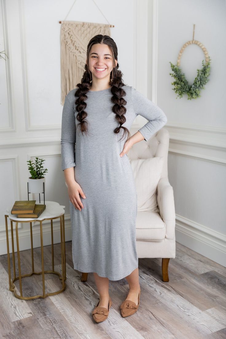 Looking for a modest, classic piece to cover all your modesty layering needs? Our Original Style Midi Layering Dress is back. As always, it is made of the softest cotton knit that was hand-selected for durability and quality. Dress it up or dress it down, the possibilities are endless! Style: Dress, Layering, Midi Length Material: Solids: 95% cotton / 5% spandex | Nuggles Famous Tee Fabric Prints: 95% rayon / 5% spandex | Tiff Fabric Care Instruction: See care label for details. Sizing: Runs tru Comfy Dresses Casual, Modest Dress Patterns, Modest Classy, Christian Modesty, Dress Layering, Modest Clothing Women, Pentecostal Fashion, Modest Outfit Ideas, Apostolic Fashion