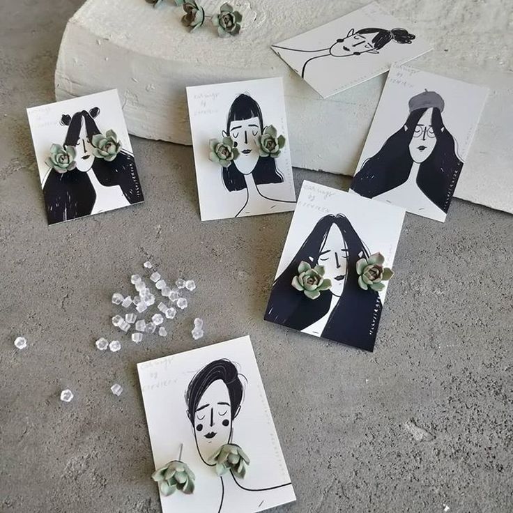 several cards with pictures of women and succulents sitting on top of each other