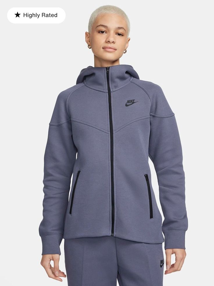 Elevate your sportswear game with this Nike Tech Windrunner Full Zip Hoodie and Pants set. The high neck, solid gray fleece fabric, and full zip closure offer both style and functionality, while the Nike logo accents add a touch of branding. The long sleeve hoodie with a hood is perfect for all seasons, from winter to summer, and can be worn for various sports and activities, from golf to basketball to bodybuilding. The cotton blend material is machine washable for easy care and maintenance. This unisex adults' athletic hoodie and pants set is perfect for those who appreciate both performance and style. Nike Windrunner, Nike Sportswear Tech Fleece, Nike Tech Fleece, Nike Tech, Newest Jordans, Tech Fleece, Carbon Black, Grey Nikes, Natural Minerals