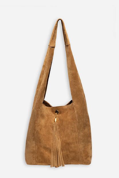 Crafted from 100% rich suede, the Tassel Chain Italian Suede Hobo Bag is perfect for daily use. Featuring a comfortable shoulder strap and wide top opening, this classic hobo style bag is finished with a decorative leather tassel at the front and a hook and eye closure. Pair with relaxed fit jeans and a casual blouse for a classic weekend look. Johnny Was Women's Tassel Chain Italian Suede Hobo Bag in Tan Brown, Leather/Suede Elegant Everyday Suede Hobo Bag, Chic Suede Hobo Bag With Suede Lining, Suede Shoulder Bag With Gold-tone Hardware For Travel, Suede Tote Shoulder Bag With Gold-tone Hardware, Elegant Suede Hobo Bag With Suede Lining, Luxury Suede Hobo Bag With Soft Leather, Elegant Suede Hobo Bag, Rectangular Suede Hobo Bag With Suede Lining, Suede Crossbody Shoulder Bag With Gold-tone Hardware