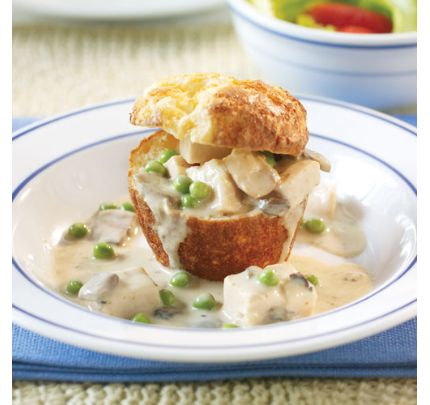 a white plate topped with chicken pot pie