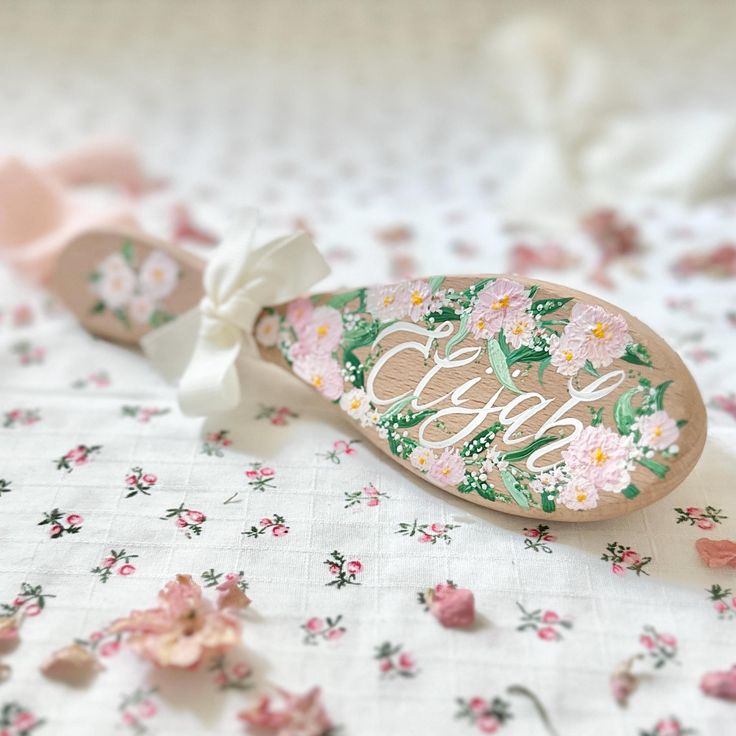 Add a bit of shimmer and shine to your nursery shelf with a lovingly hand painted baby hairbrush personalised with a name to create a truly unique keepsake for a new arrival. ❖ Raw Materials Handle: Natural Wood  Bristle: Soft Goat Hair  Ribbon: Grosgrain Each soft bristle hairbrush is made of goat hair, ideal for promoting healthy hair growth and stimulating blood flow to the scalp without pulling or damaging your baby's delicate hair.  ❖ Dimensions Large Hairbrush: W 7 cm x H 18 cm  Medium Hai Painted Hairbrush, Baby Hair Brush, Nursery Shelf, Stocking Ideas, Personalized Newborn, Promote Healthy Hair Growth, Hair Ribbon, Goat Hair, Healthy Hair Growth