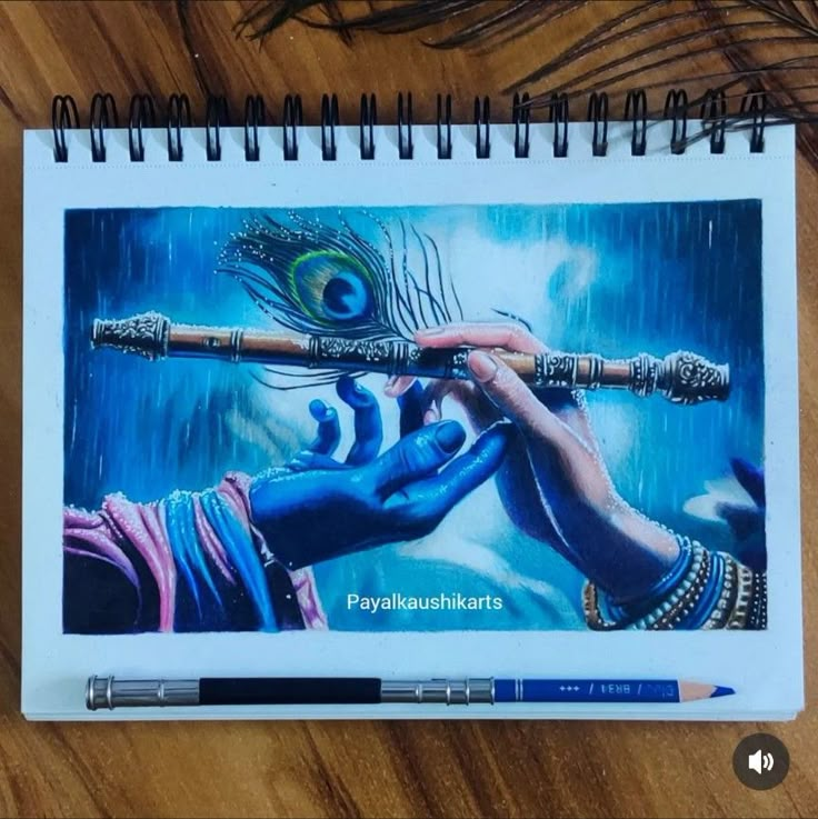 a spiral notebook with a drawing of a person holding a peacock feather on it's tip