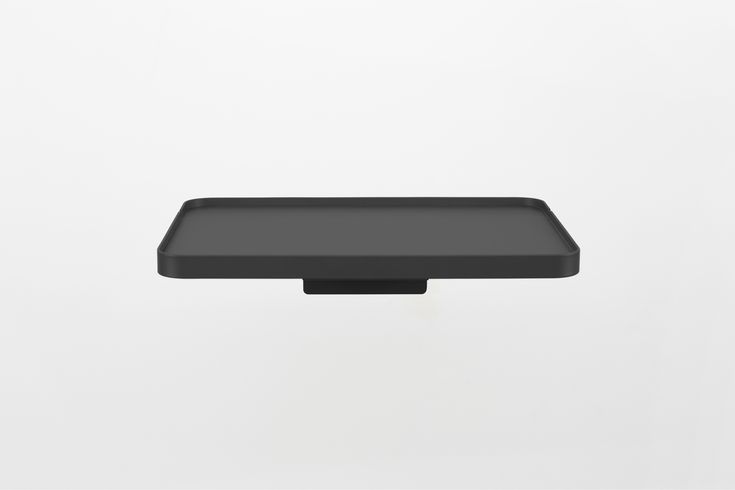 a black rectangular object on a white background