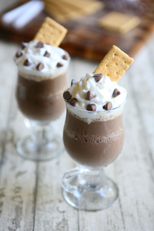 two glasses filled with ice cream and chocolate chips