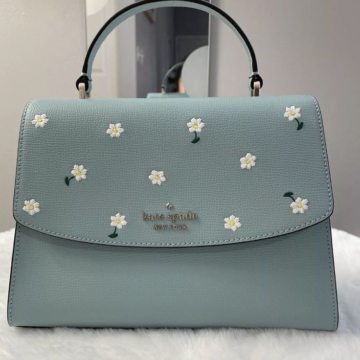 Nwt Kate Spade Embroidered Lea Top Handle Satchel Crossbody Aphrodite $379 7.13"H X 9.63"W X 3.5"D (Bottom) 7.13"H X 9.63"W X 2"D (Top) Handle Drop: 2.88" Strap Drop: 22" Refined Grain Leather Metal Pinmount Logo Two Way Spade Jacquard Lining Interior Front & Back Zip Pocket Exterior Back Slip Pocket Flap With Magnetic Snap Closure Kate Spade Luxury Bags For Spring, Luxury Kate Spade Bags For Spring, Spring Luxury Kate Spade Bags, Chic Embellished Bags For Spring, Blue Bags With Floral Embroidery For Spring, Spring Embroidered Bag, Stylish School Bags, Girly Bags, Fancy Bags