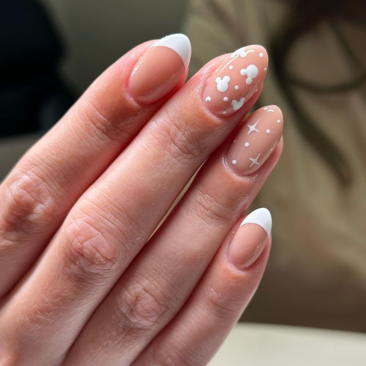 10 Disney Nail Ideas That Are Simply Perfection - That Disney Fam Disney Princess Nails Easy, Disney Nails Short Almond, Wedding Disney Nails, Minnie Mouse Manicure, Short Almond Disney Nails, Short Nail Designs Disney, Disney Dip Nail Designs, Nails Disney Simple, Disney Nail Inspo Simple