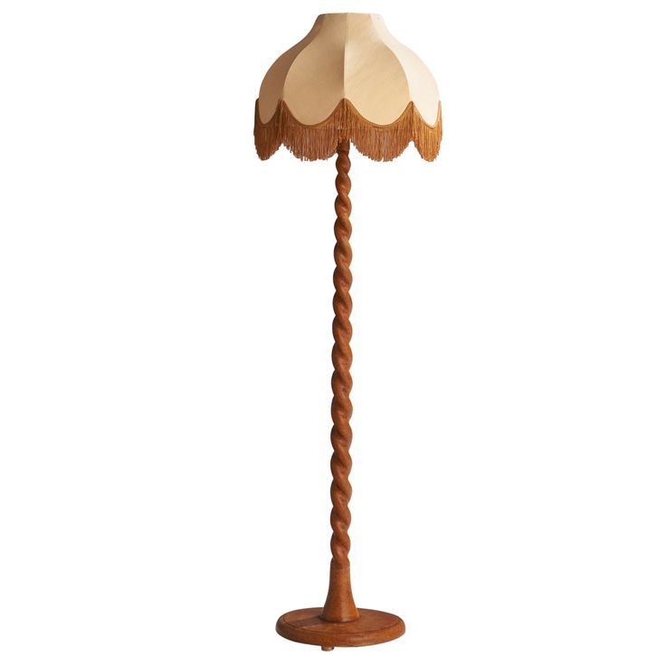 a wooden floor lamp with an umbrella shade on the top and bottom, standing upright against a white background