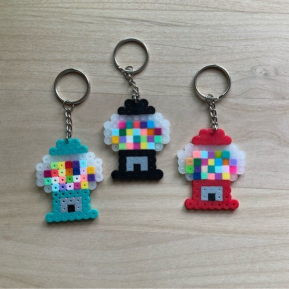 three key chains made out of lego blocks