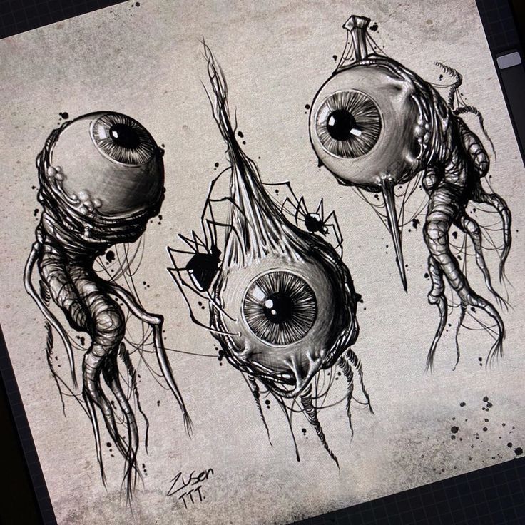 an artistic drawing of two strange looking eyes