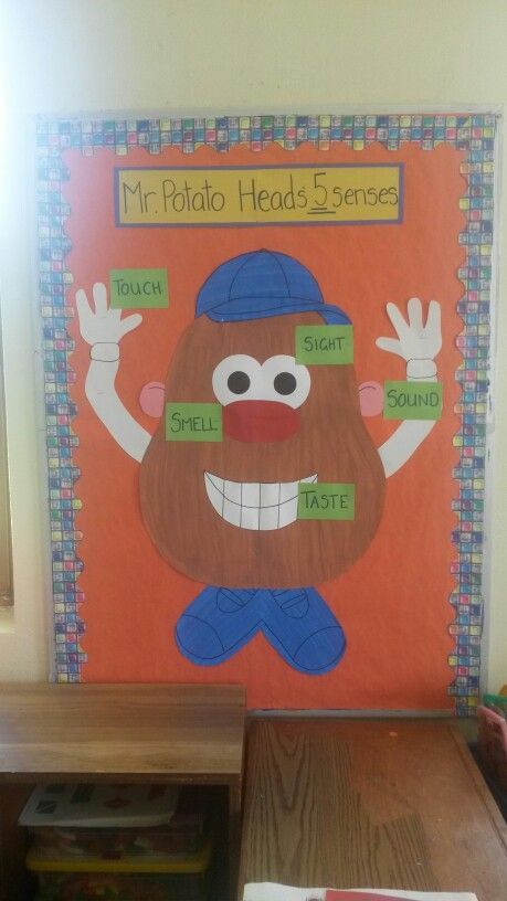 a bulletin board with an image of a potato head