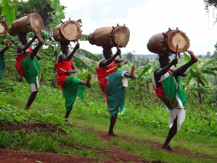 some people are carrying wood on their heads