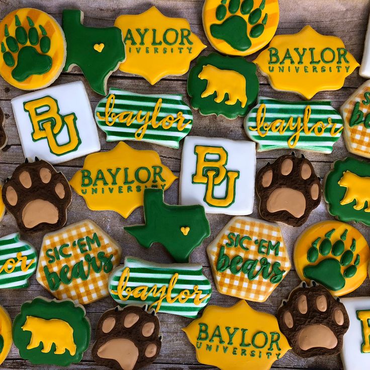 several decorated cookies with green and yellow designs