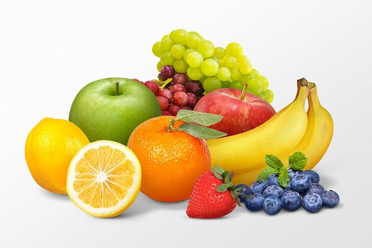 an assortment of fruit including apples, oranges, grapes and strawberries on a white background