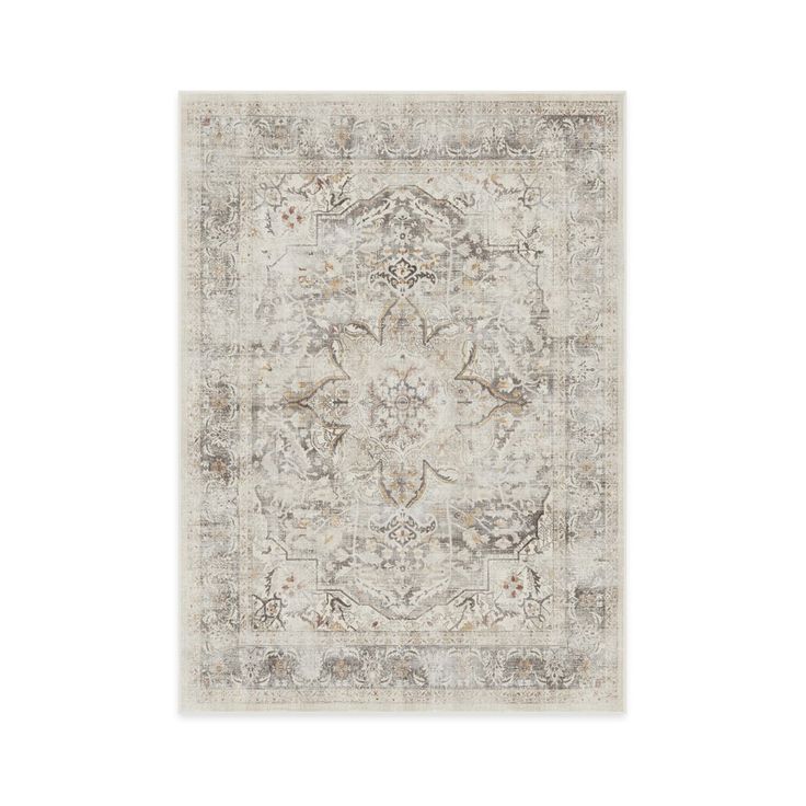 an antique style rug in grey and beige tones