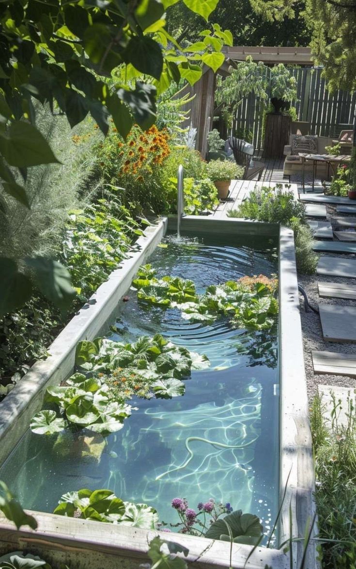 an outdoor garden with water and plants