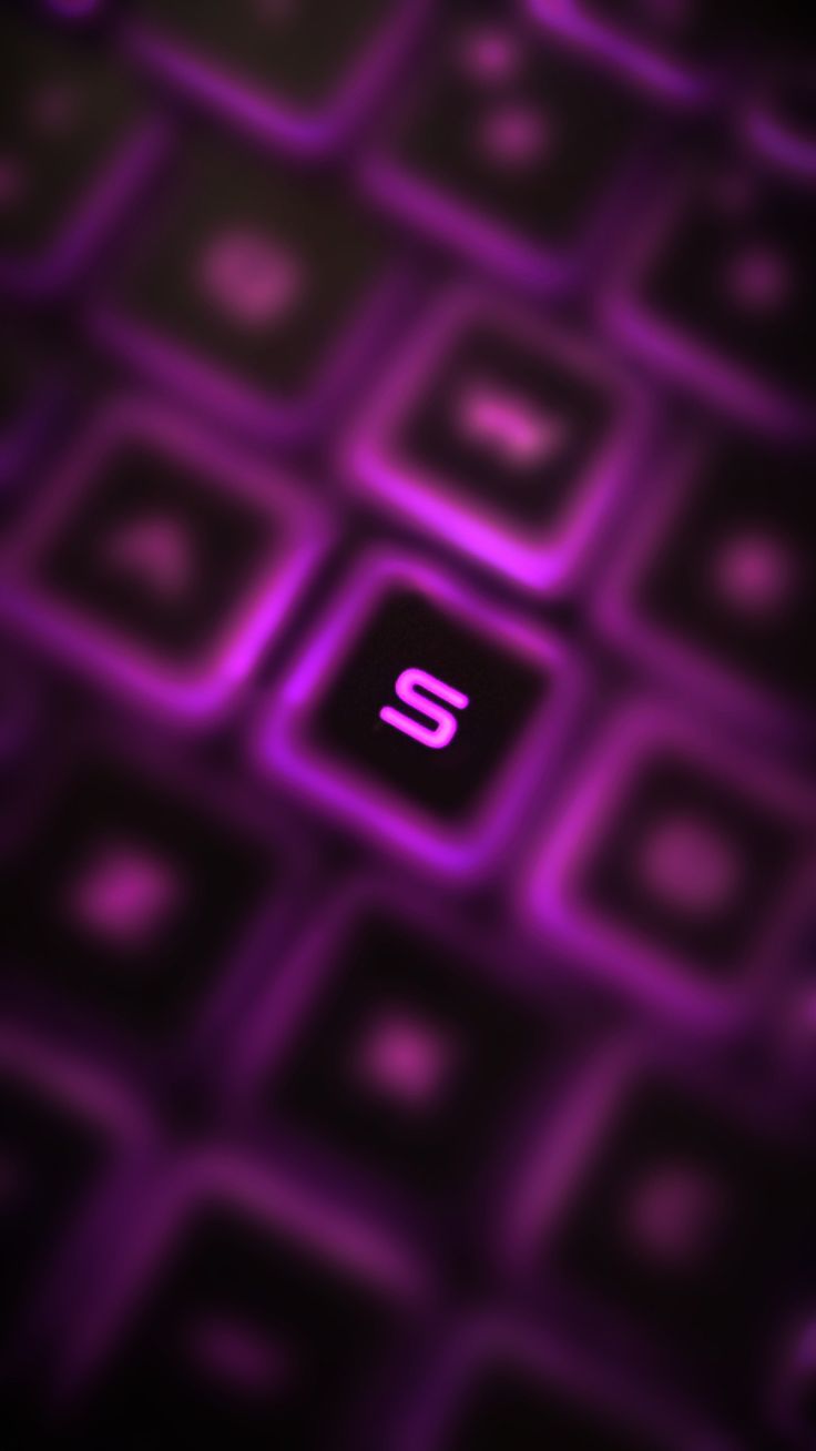 a purple keyboard with the letter s on it