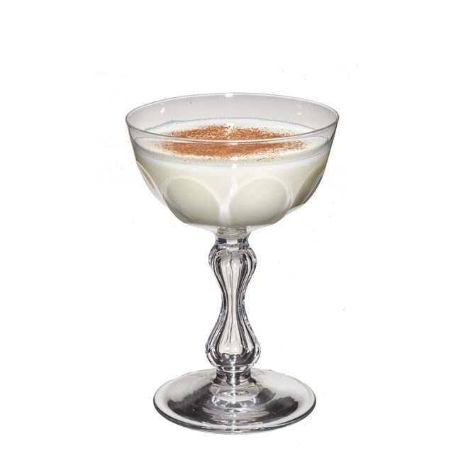 a dessert in a glass on a white background