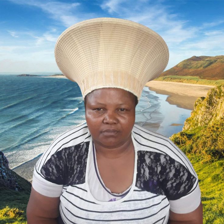 This cream white zulu hat is called ISICHOLO in traditional Zulu language and is traditionally worn during religious and cultural ceremonies. by the married Zulu woman of South Africa The form of the isicholo, or married woman's hat, developed out of a 19th-century conical hairstyle that was worn as a sign of respect to one's husband and his family, in addition to serving as a public symbol of married status. In the early 20th century, a removable hat like this one replaced the hairstyle. This z Zulu Language, Zulu Hat, Basket Hat, African Crown, African Hat, Zulu Women, Hat Cream, African Hats, Bucket Hat White