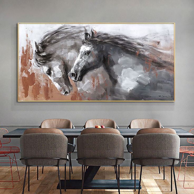 a dining room table with chairs and a large horse painting on the wall above it