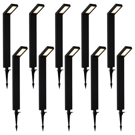 six black outdoor lights with one light on each side and five in the middle, all lit up