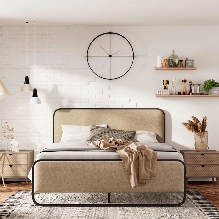 a bedroom with white brick walls and wooden flooring, a large bed in front of a clock mounted on the wall