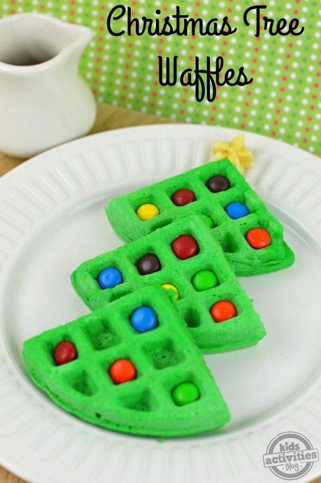 a white plate topped with christmas tree waffles