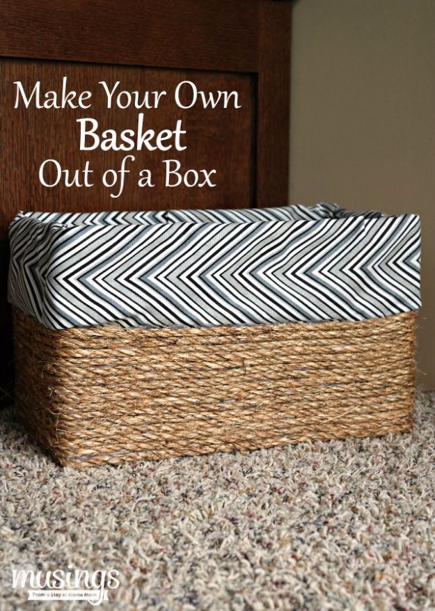 a basket sitting on top of a floor next to a wooden sign that says make your own basket out of a box