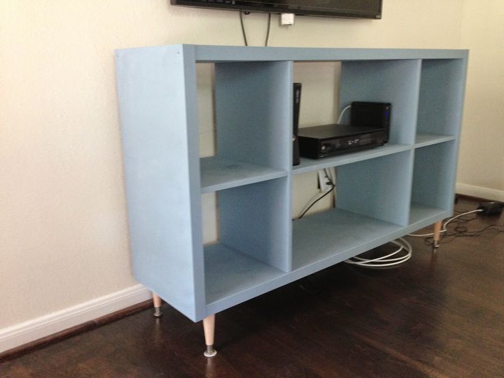 an entertainment center in the corner of a room