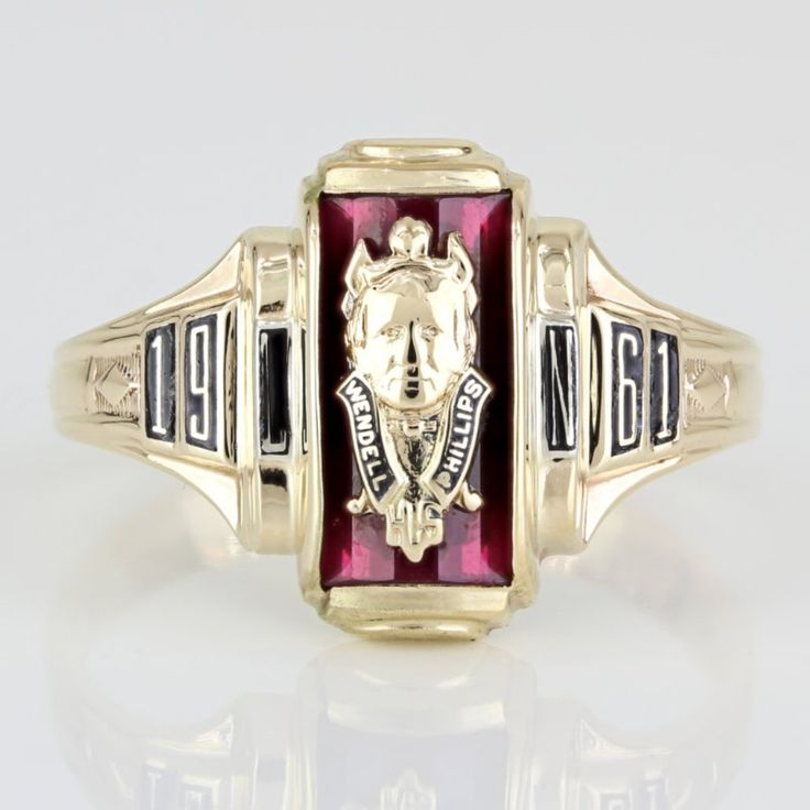 This Vintage Class Ring Is Made Of 10 Karat Yellow Gold And Is A Class Ring From Wendall Phillips High School For The Year 1961. The School's Crest Is Set On The Front, With A Synthetic Red Stone Being Used As A Backdrop For It. Wendall Phillips High Is Located In The Bronzeville Neighborhood Of Chicago, Il. Produced By Jostens And Has "Josten's 10k" Stamped Onto The Inner Part Of The Band. This Ring Can Be Resized By Any Qualified Jeweler. Size: 7.25 Metal: 10 Karat Yellow Gold Weight: 2.65 Dwt / 4.13 Grams Stones: Synthetic Red Gemstone 831082-1* E-1085 Vintage 14k Gold Rings For Commemoration, 1983 Ladies Gold Class Ring, Vintage Class Rings, Class Rings High School Reeds Jewelers, Class Rings High School Vintage, Gold Class, Graduation Rings, Red Gemstones, Red Stone