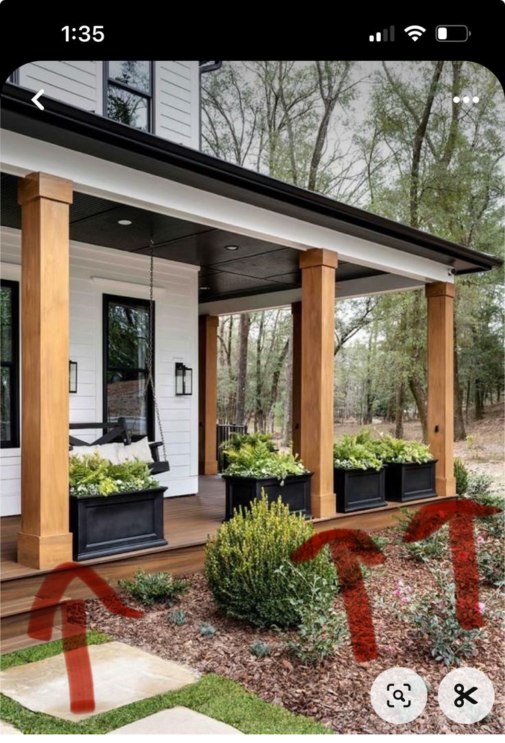 an image of a porch with plants on the front and back sides, in red tape