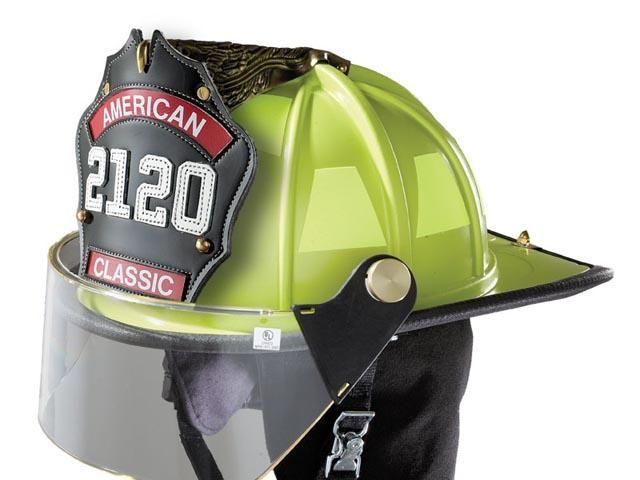 a green helmet with the number 120 on it