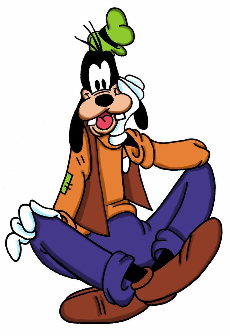 an image of goofy sitting on the ground with his feet crossed and tongue out,