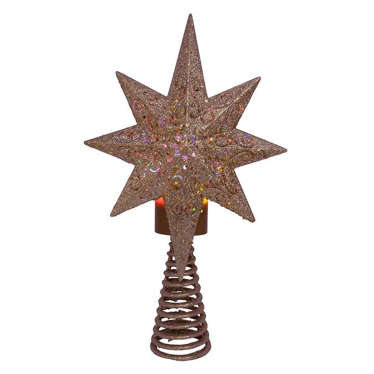 a lighted christmas tree topper in the shape of a star on a white background