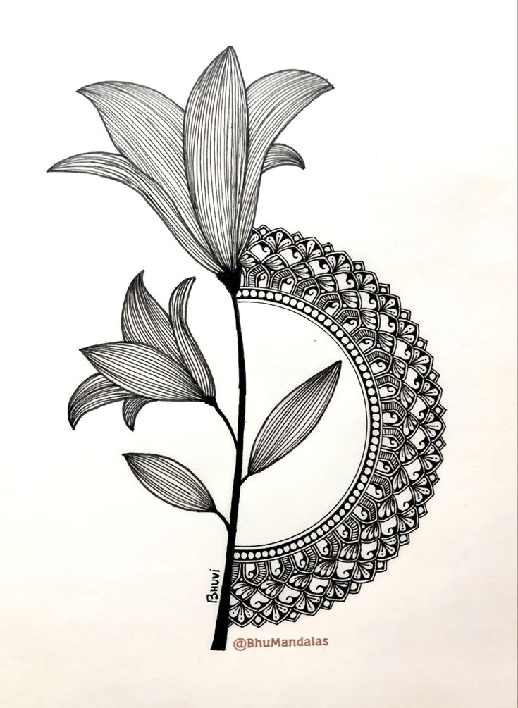 a black and white drawing of a flower