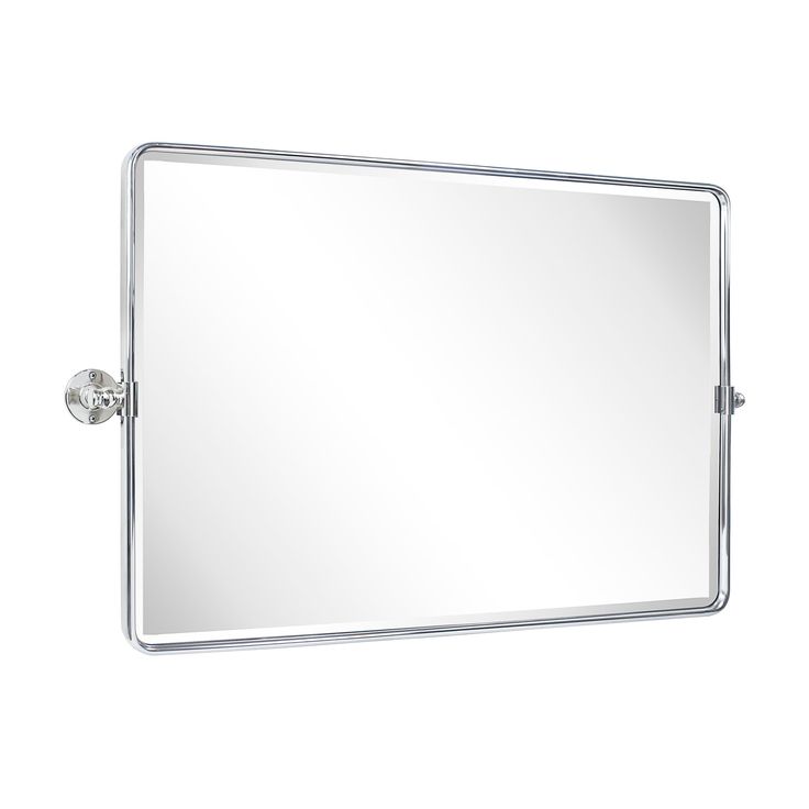 a bathroom mirror that is hanging on the wall with a metal frame and chrome fittings