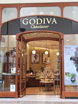 the front entrance to godiva chocolaterie