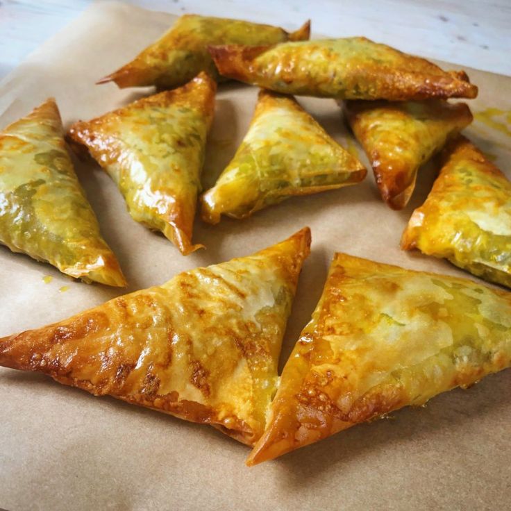 some food is laying out on a piece of wax paper and ready to be eaten